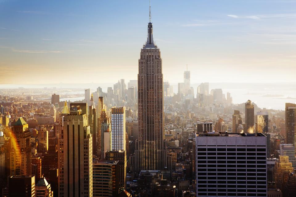 The Empire State Building above the Manhattan skyline at golden hour